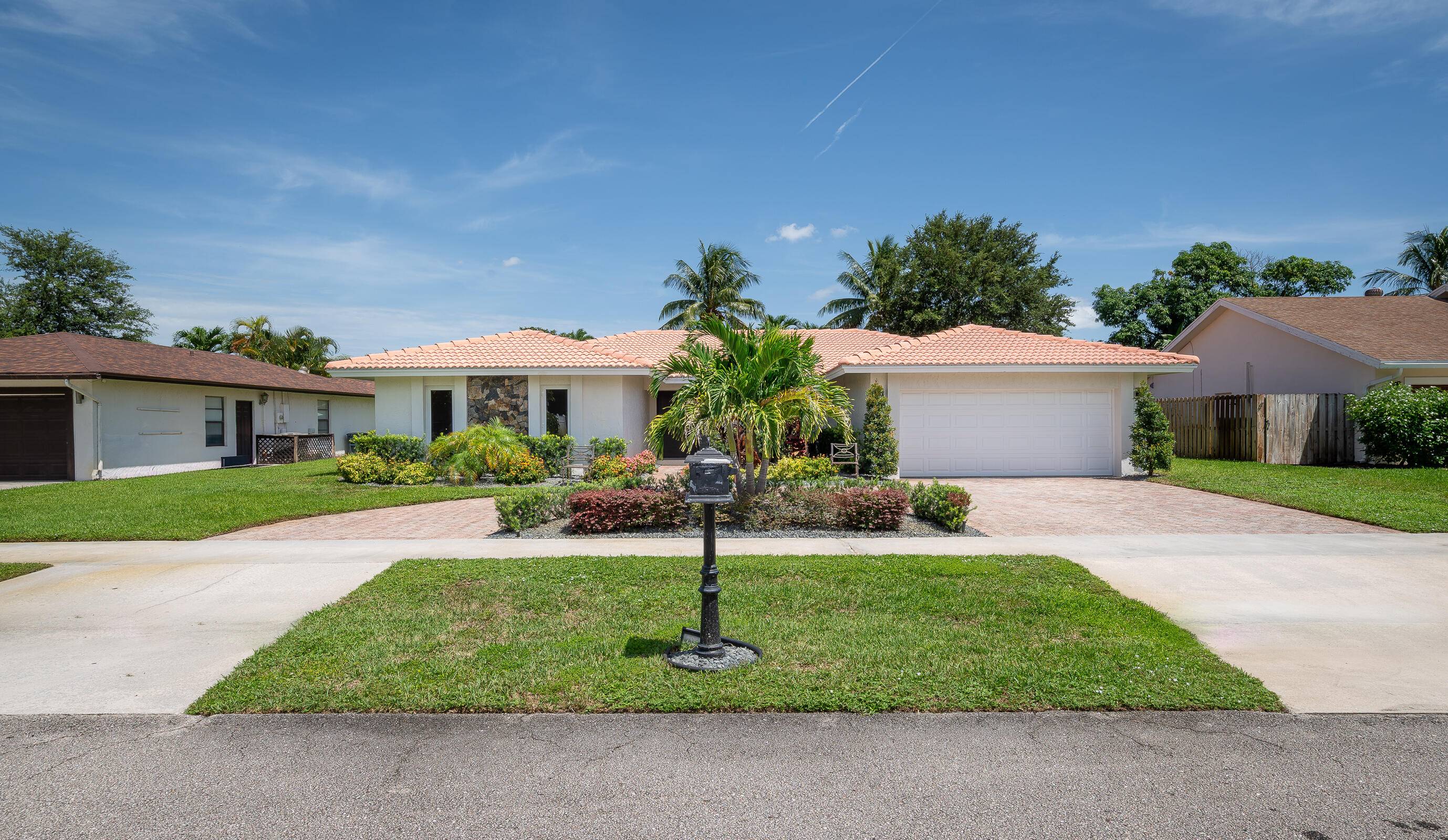 Welcome to your dream home in the highly sought after Pheasant Walk community of Boca Raton.