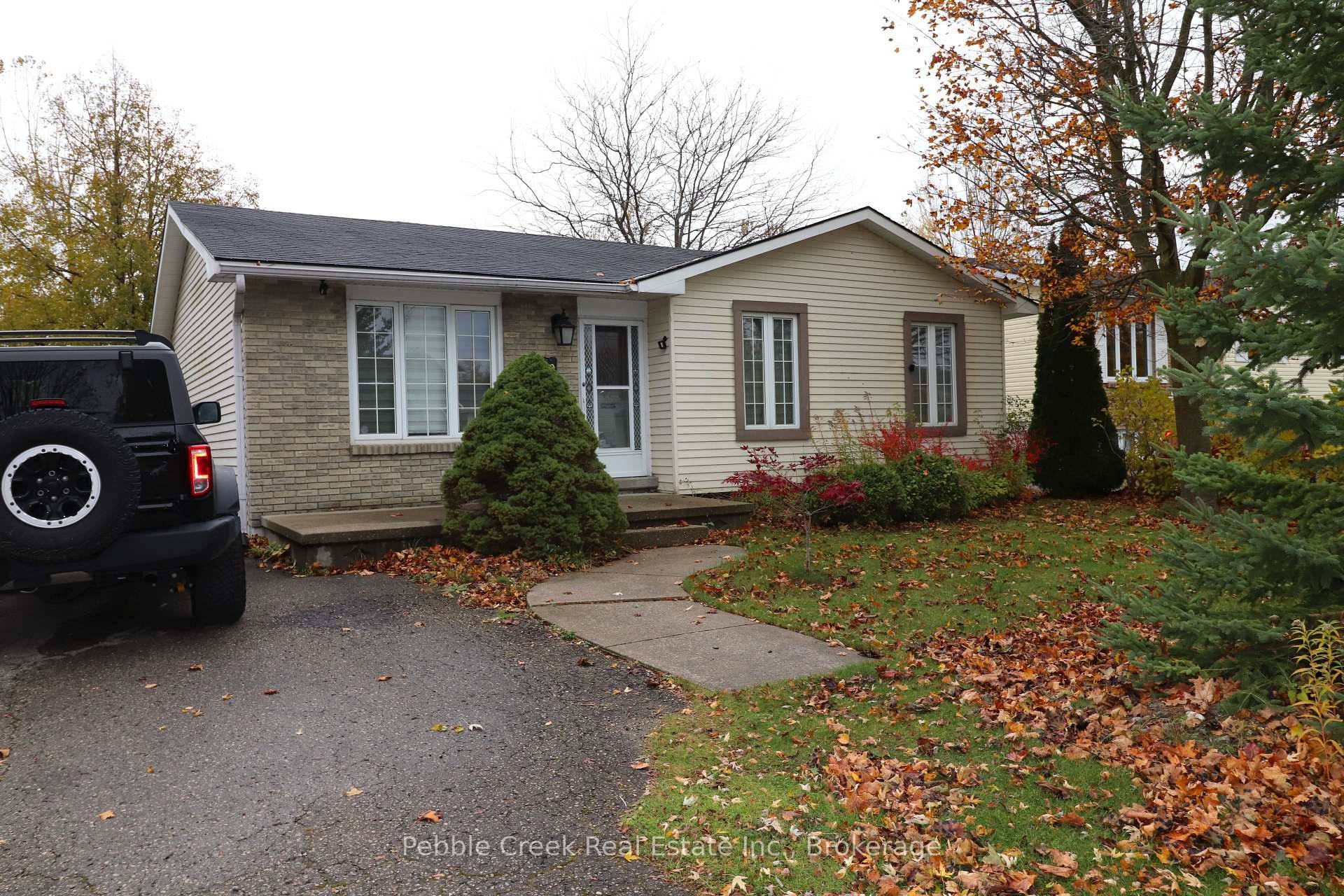 Fantastic bungalow with in ground pool located on a quiet street in the very desirable lakeside community of Kincardine !