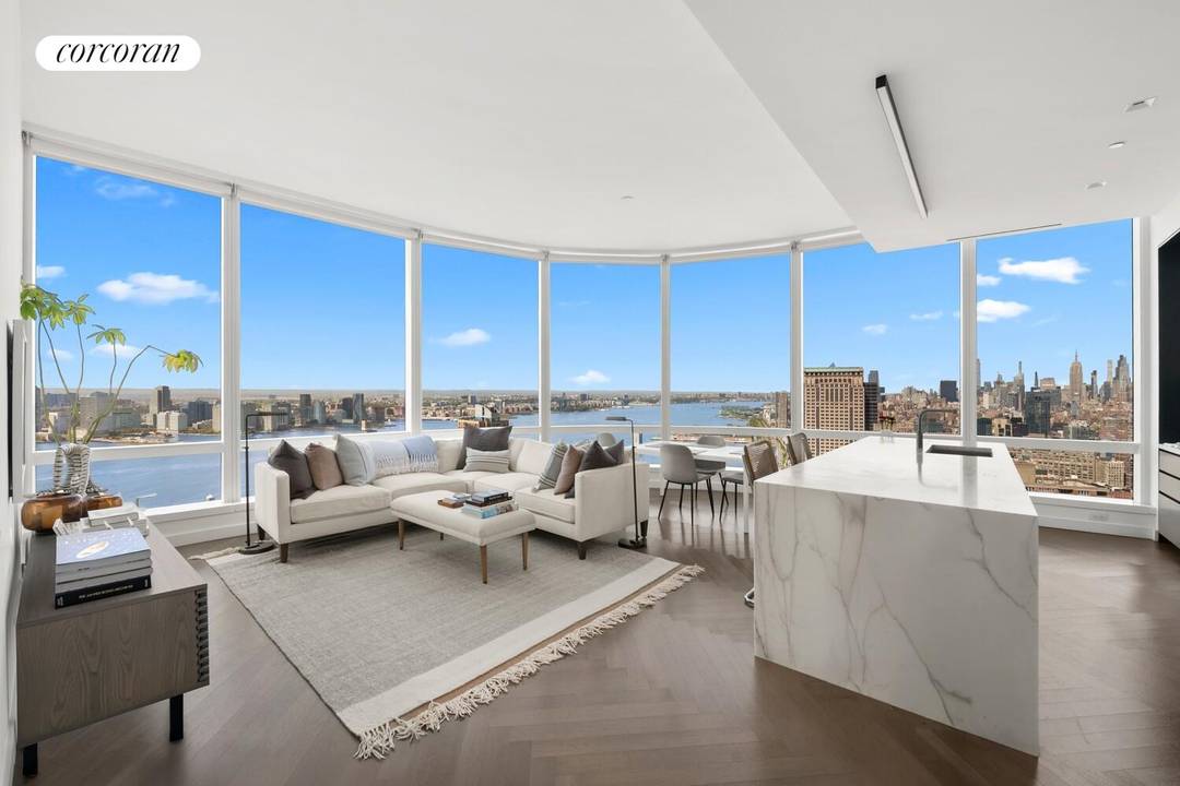 Perched on the 44th floor of 111 Murray Street, this extraordinary three bedroom, three and a half bathroom residence offers breathtaking panoramic views of the Hudson River and beyond, framed ...