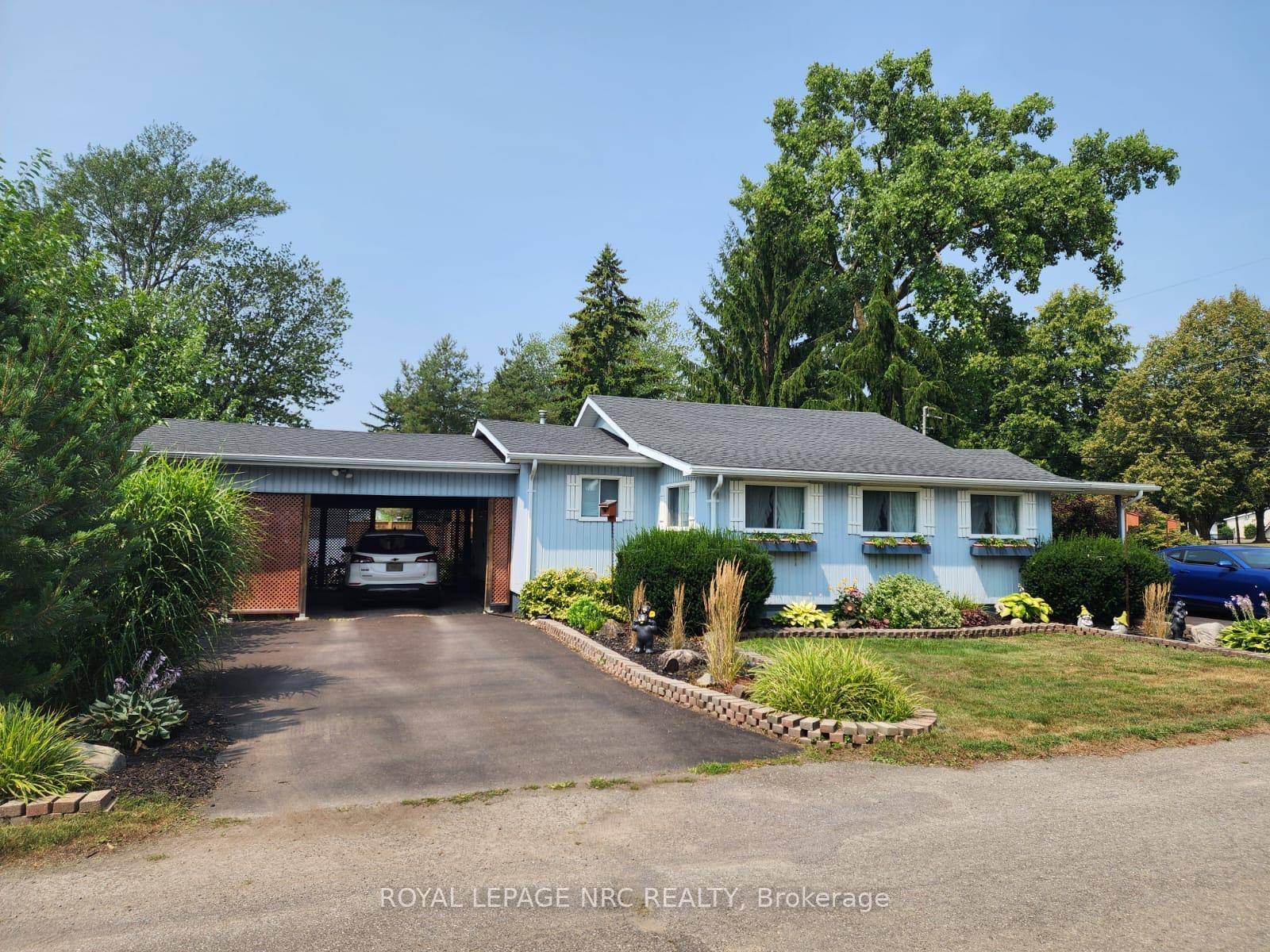 Welcome to 35 Belvidere Road a charming and well kept bungalow nestled on a generous 107 x 88 corner lot in the heart of Crystal Beach.
