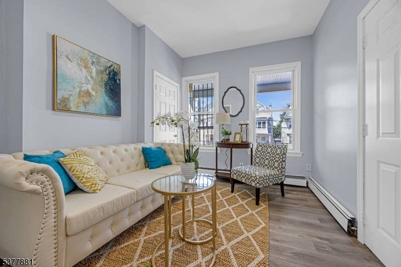 Welcome to 1088 Grove St, a versatile 2 family perfect for an owner occupant or investor.