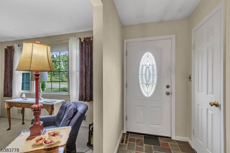 Looking for a warm, inviting home tucked away in a peaceful, private setting ?