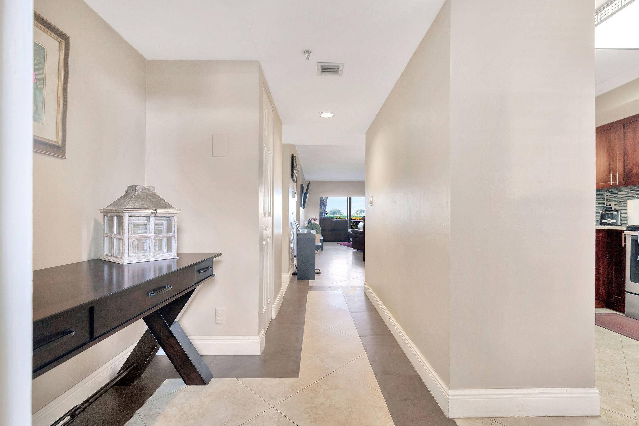 Beautifully upgraded first floor unit with stunning golf course views Excellent central Boca Location.
