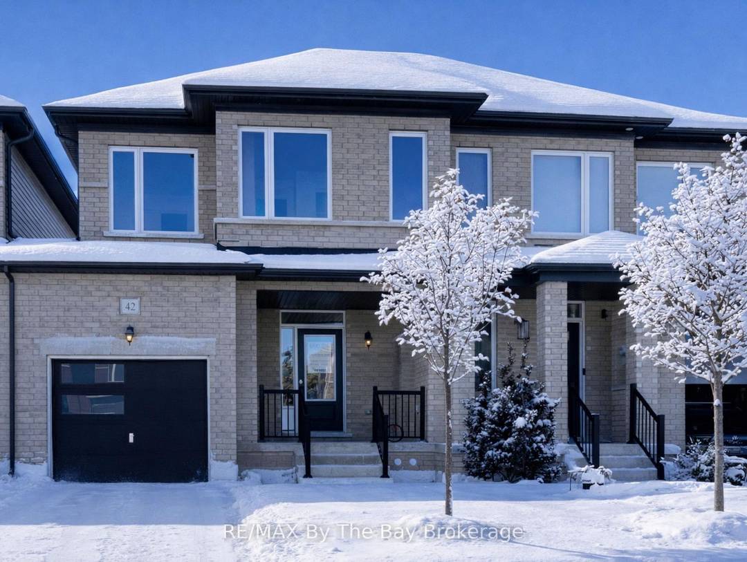 Welcome to 42 Lisa Street, a brand new, move in ready all brick and stone freehold townhome by Baycliffe Communities, located in the highly sought after Wasaga Sands neighbourhood.