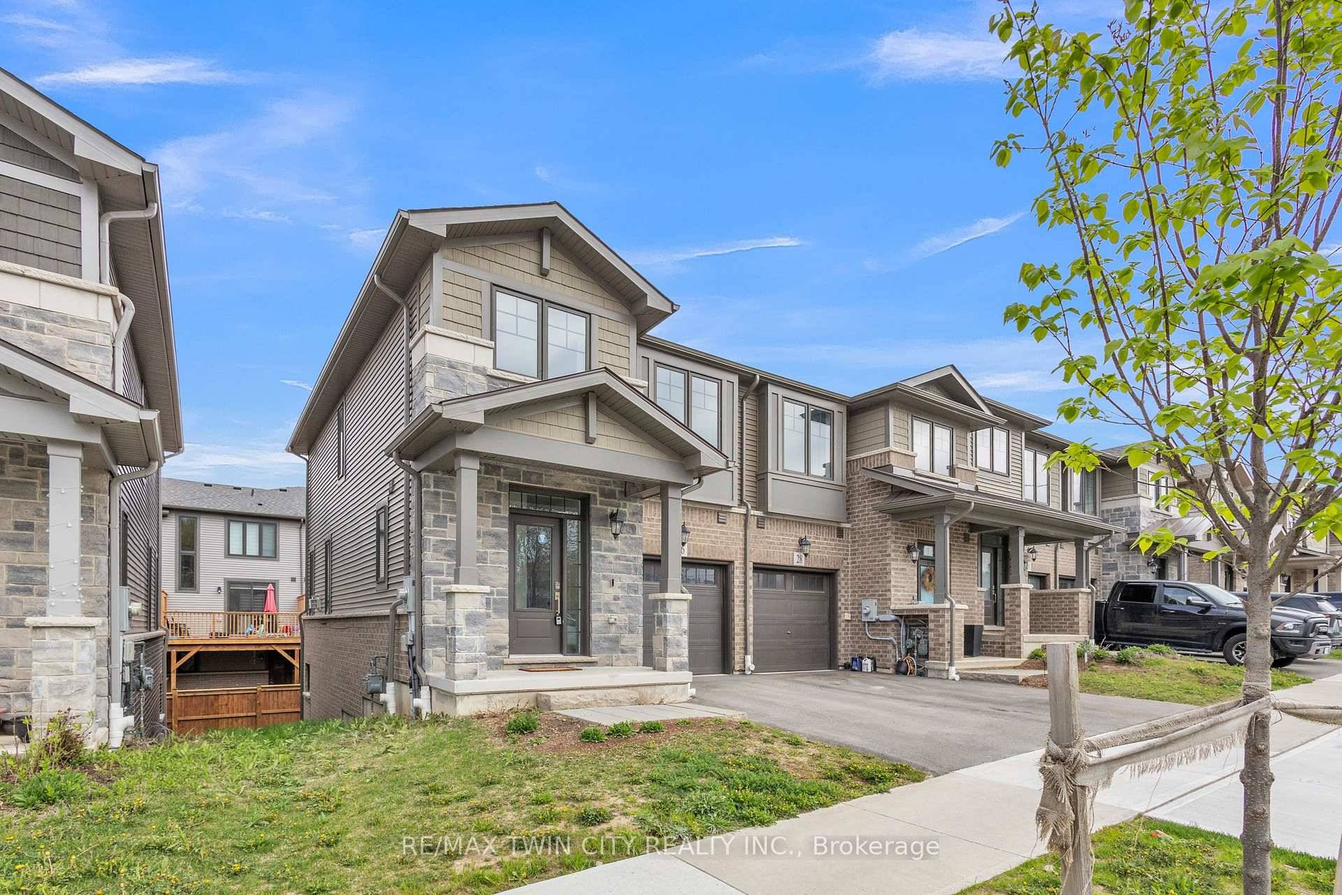 Highly upgraded freehold end unit townhome with a walk out basement, located in one of Cambridges most desirable communities.
