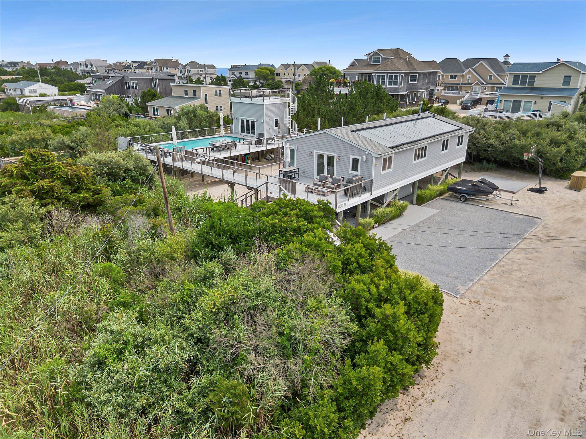 Dune Road beach house in The Hamptons absolutely packed with amenities !