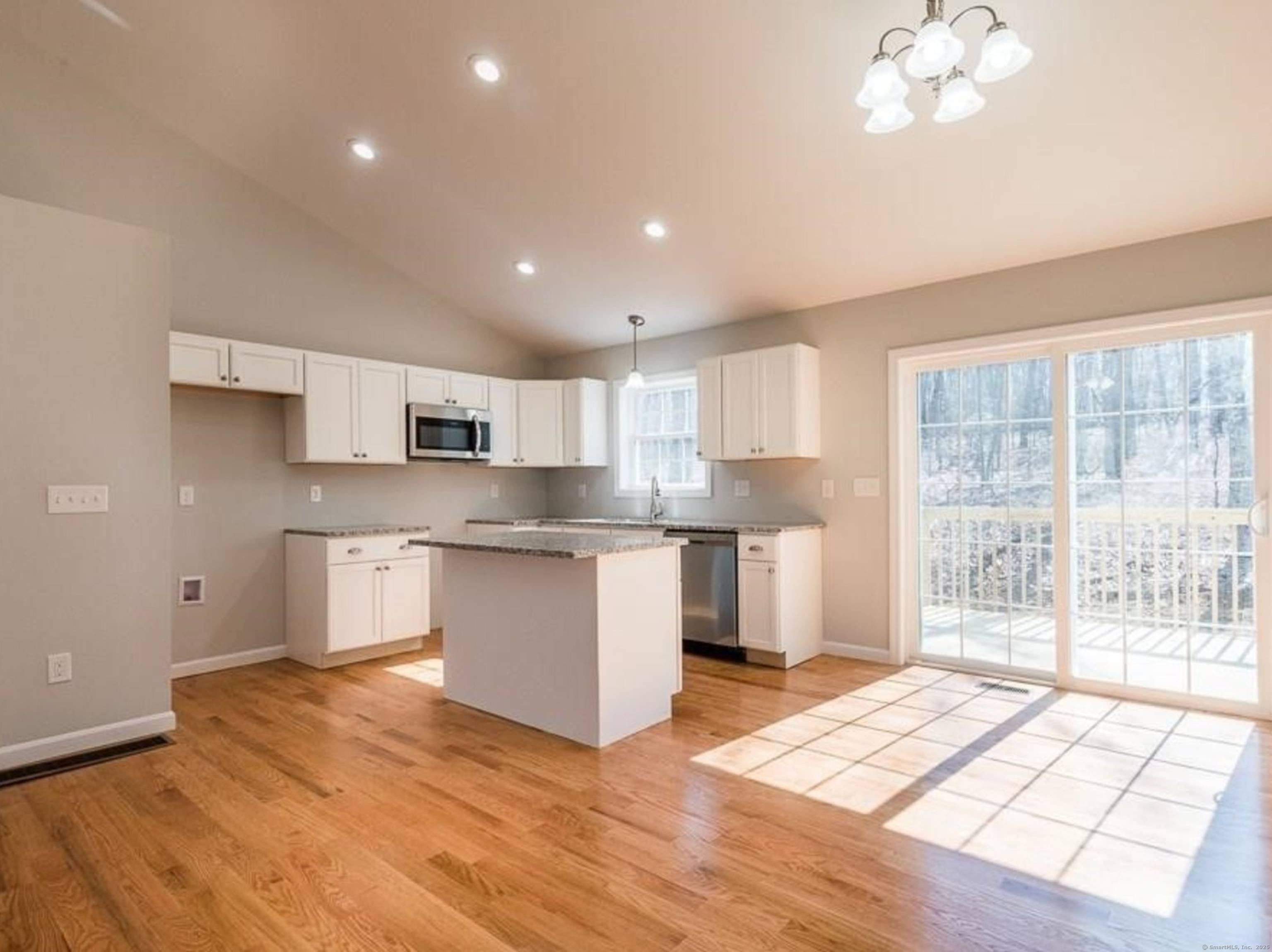 Brand New Contemporary Raised Ranch on a Beautiful 1 Acre Wooded Lot in Brooklyn.