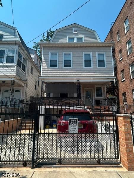 Welcome to this amazing 3 family home featuring three spacious units plus a walk out basement !