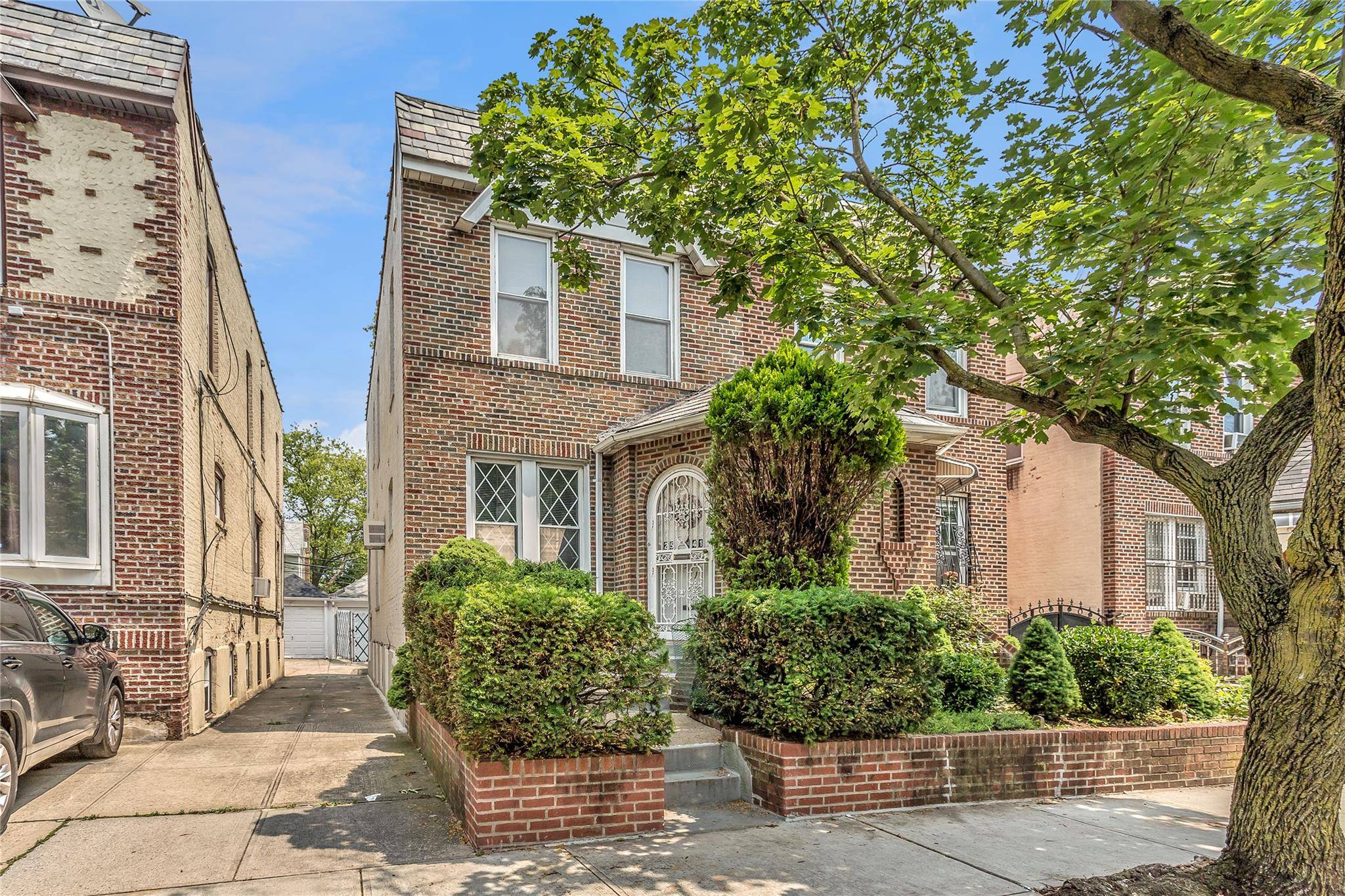 Welcome to this beautiful Spacious Brick Home Located In the Heart of East Elmhurst.