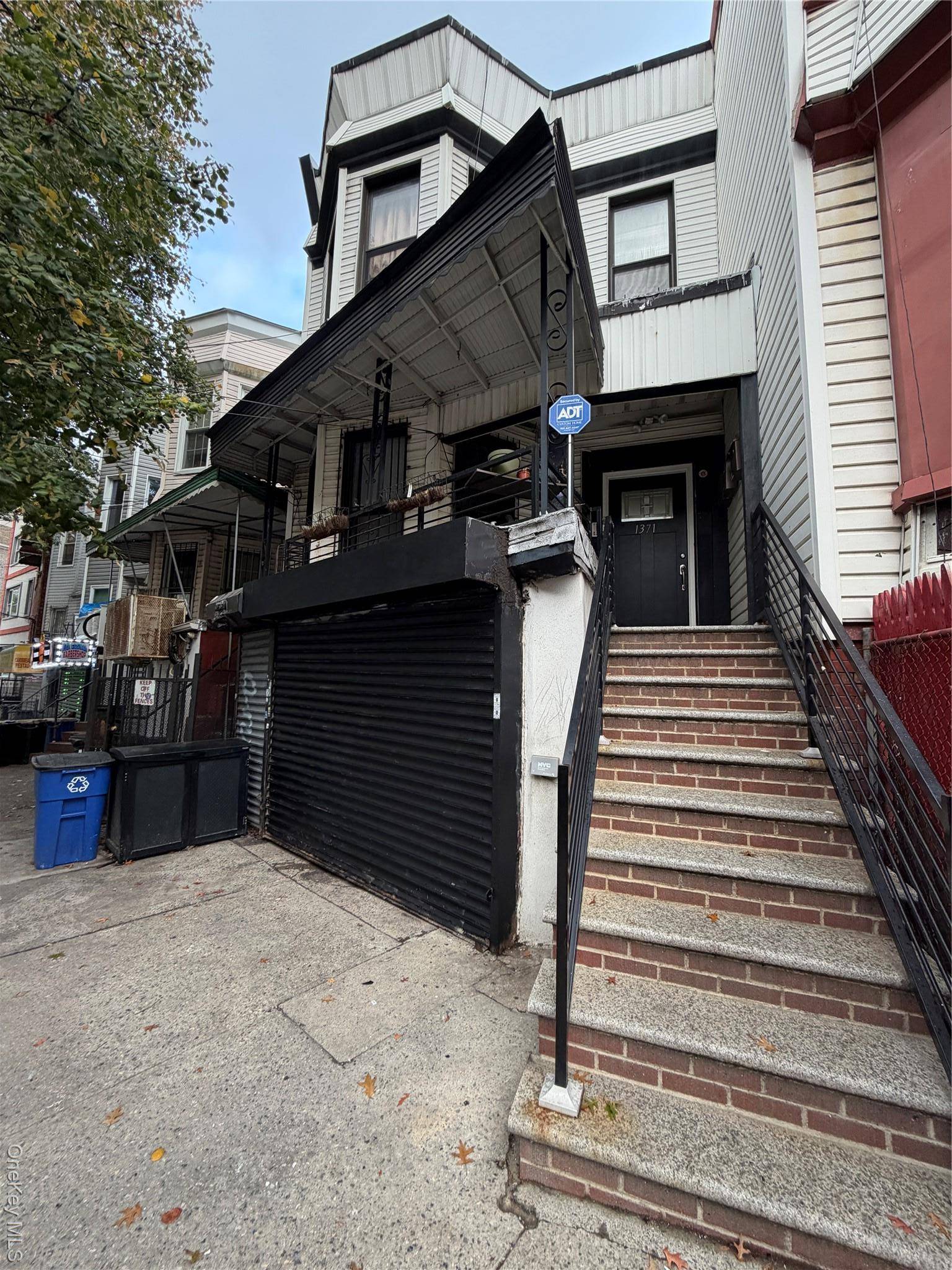 Fully renovated and income producing, this three unit mixed use property generates over 8, 300 per month and features two spacious 3 bedroom apartments above a commercial space leased as ...
