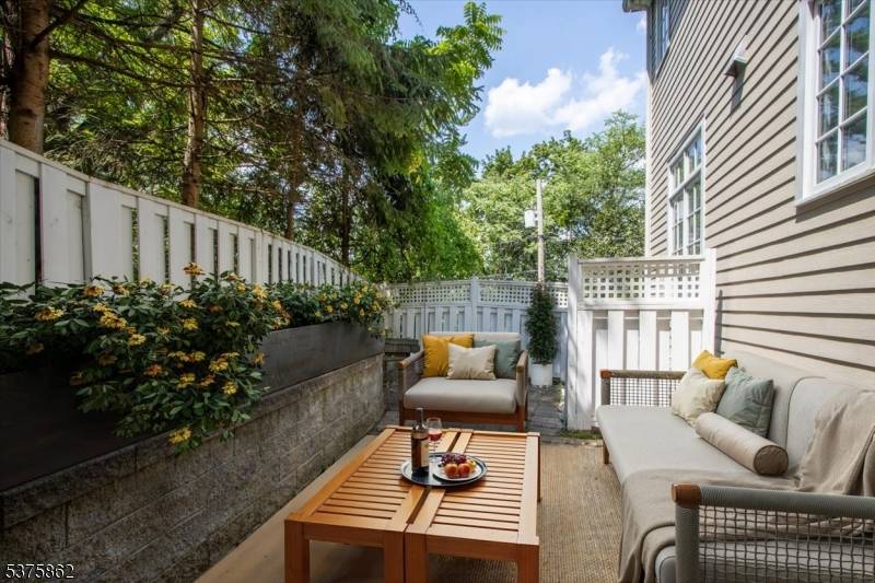 Tucked in the heart of Morristown steps from the Green, this end unit townhome style condo offers the space of a house with the ease of condo living.