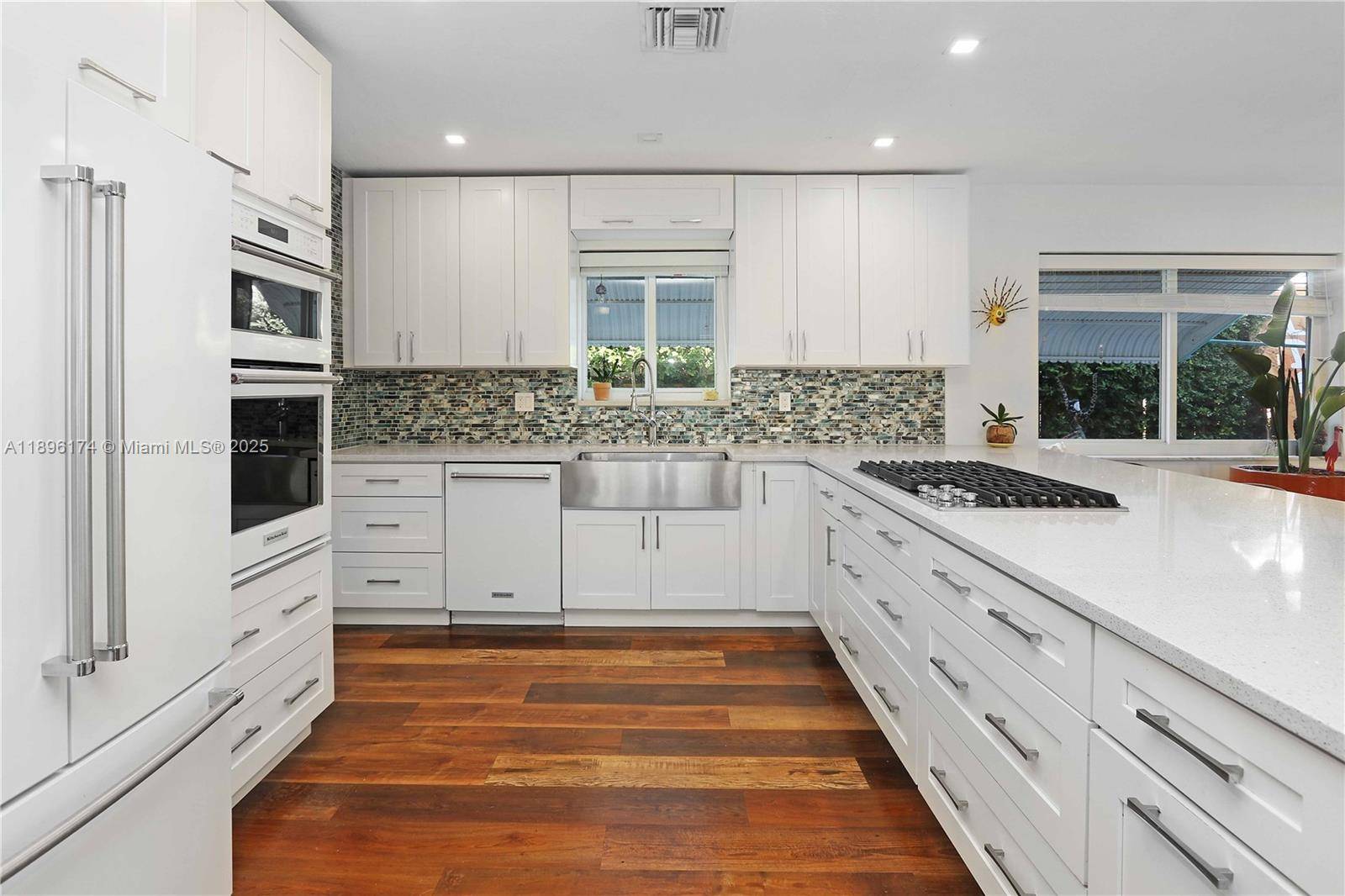 Your slice of paradise ! Fully renovated Mid Century Modern home on beautiful historic Hollywood Blvd, walkable to the beach, Young Circle and Downtown restaurants shopping.