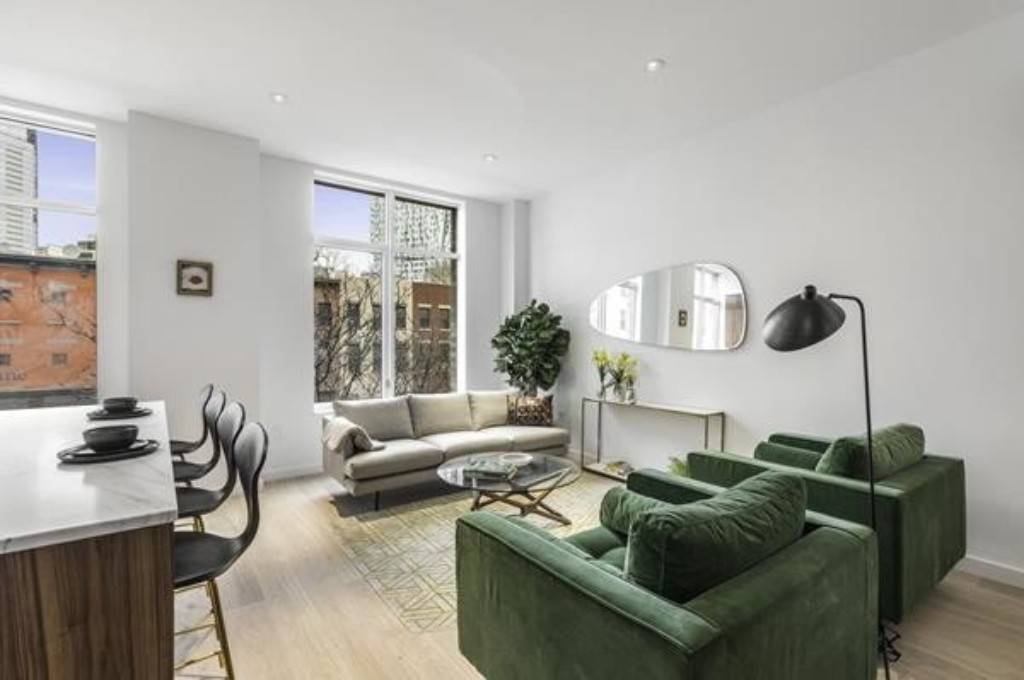 Exceptional corner 3 bedroom 2 bath in the Hendrick condominium, featuring a sprawling 1, 445 sf layout with an inviting 30' great room, 10' ceiling heights throughout, 7 wide hand ...