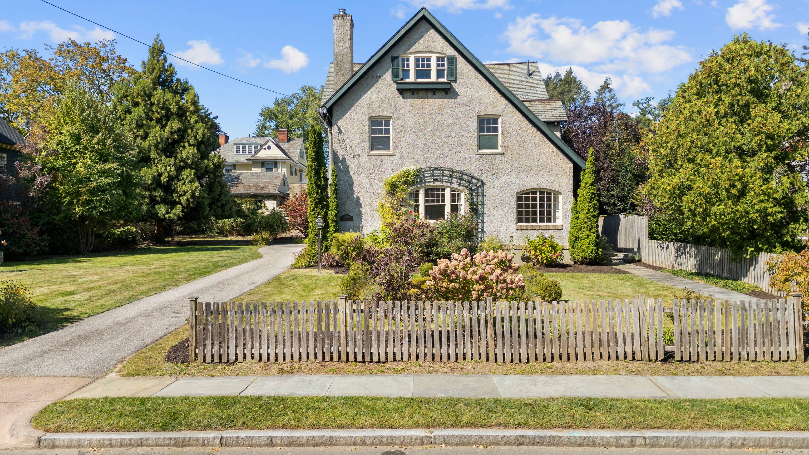 This Stunning Stucco and Slate English Colonial is just a Few steps away from Prestigious Elizabeth Park and it offers far more space than meets the eye.