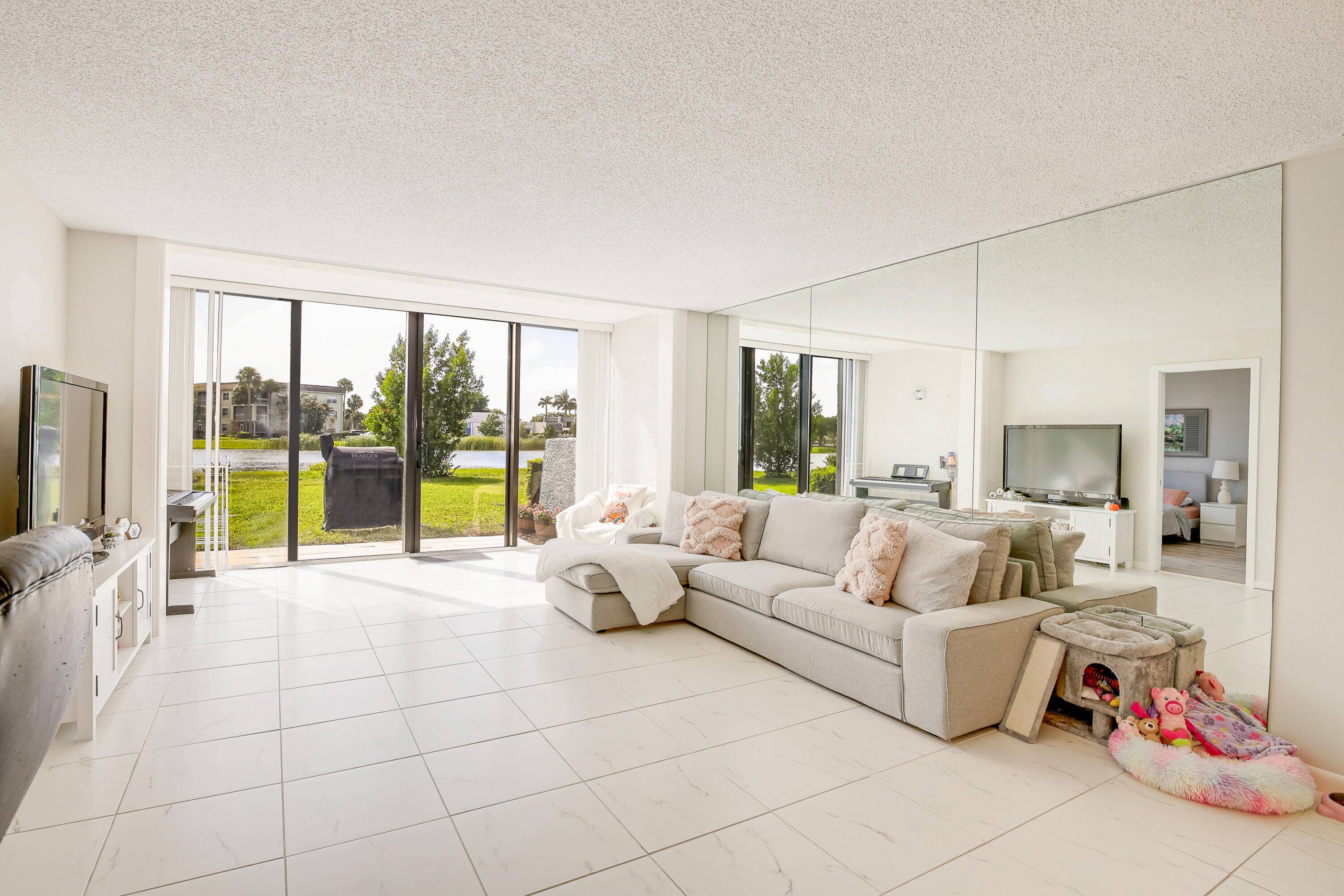ALL AGES WELCOME Beautiful lakefront condo on first floor offers stunning waterviews.