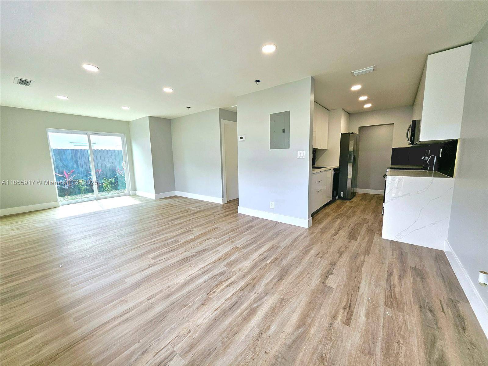 Welcome home to this spacious and meticulously renovated 5 bedroom, 3.