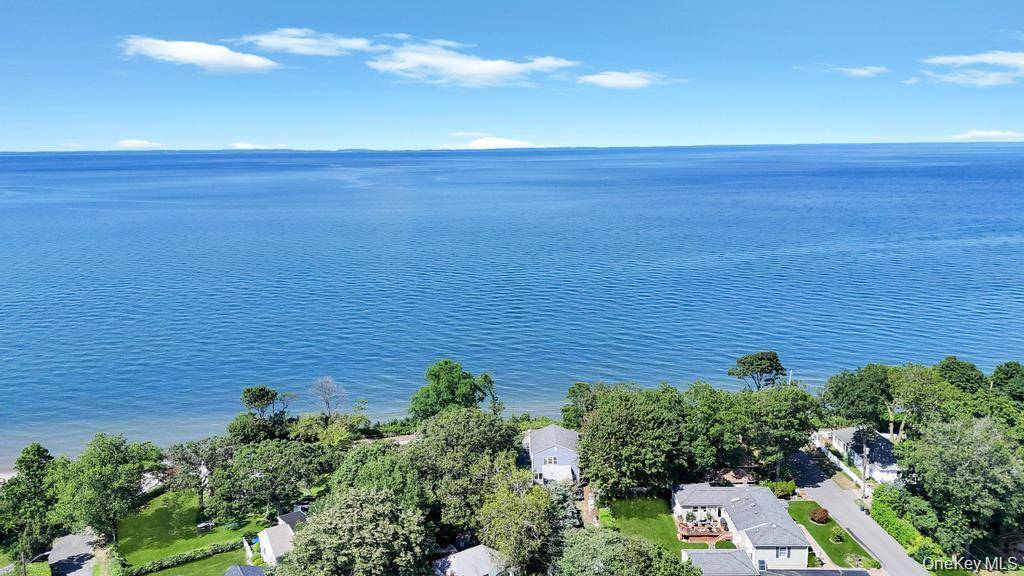 Million Dollar Waterfront View with a Primary House and Cottage An Opportunity of a Lifetime !