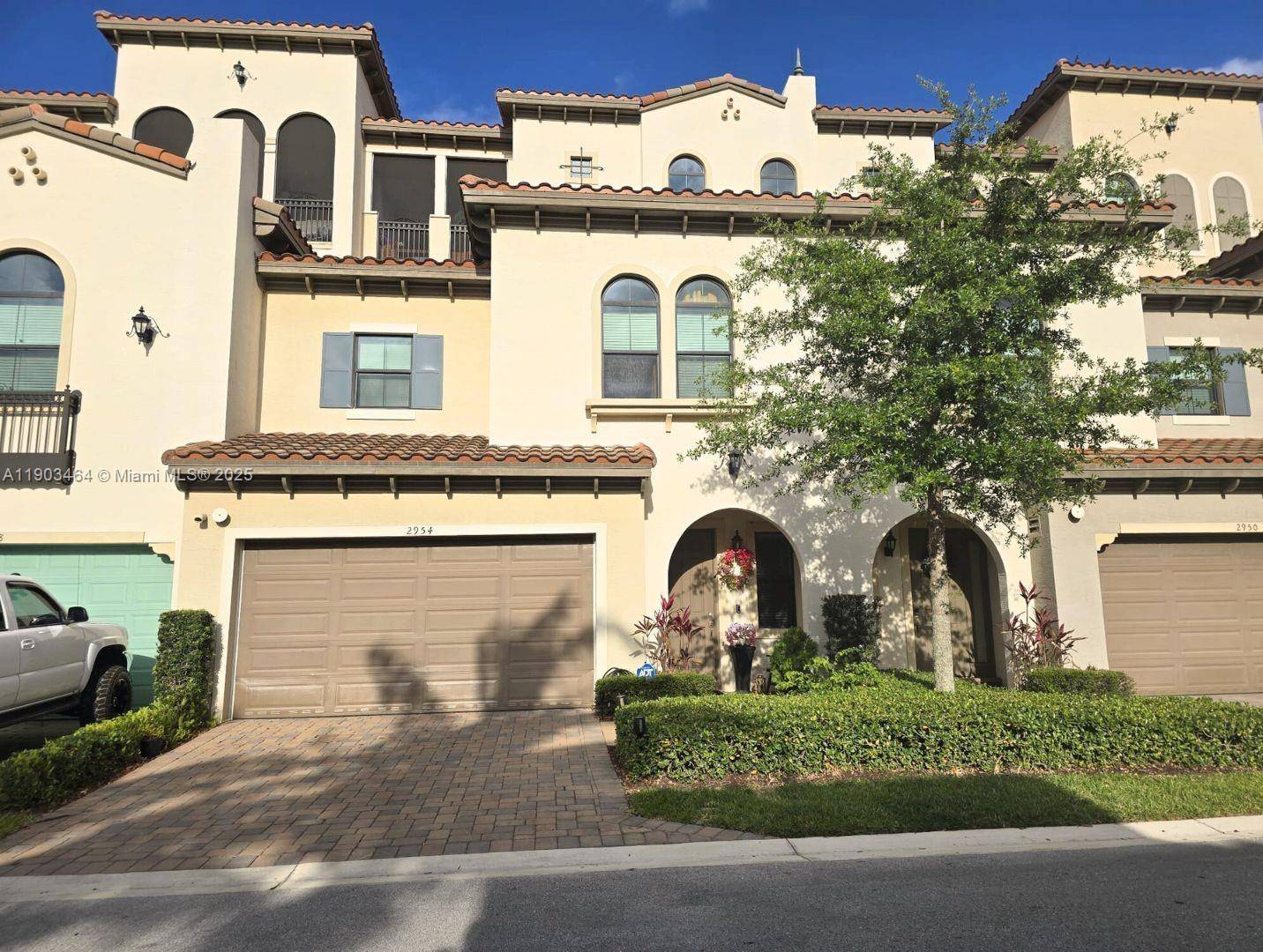 Built in 2019, this stunning 4 story townhome in the guard gated Artesia community offers space, style, and resort style living.
