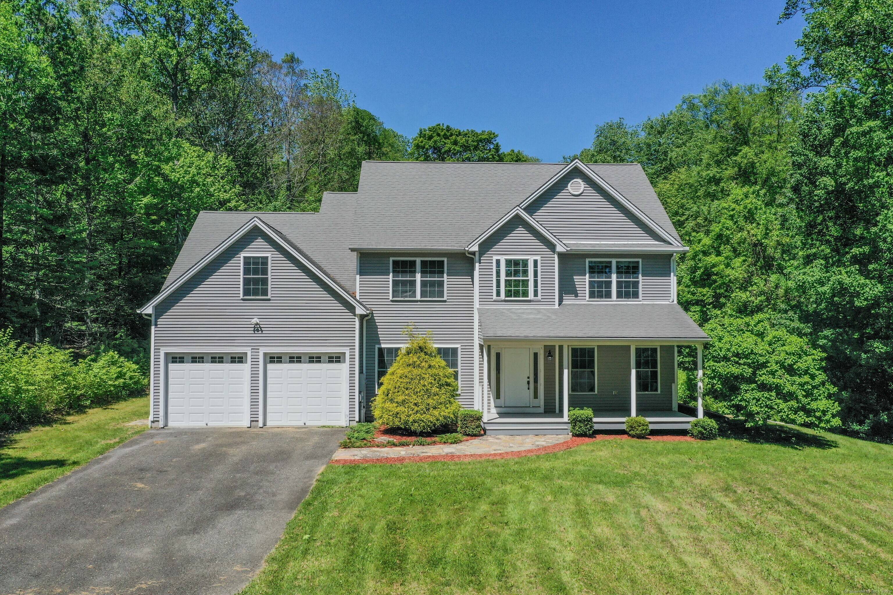 Welcome to this beautifully updated 2, 700 square foot Colonial that perfectly blends classic charm with modern finishes.