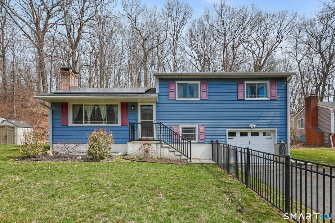 Welcome to this beautifully maintained split level home located on King Street in Danbury's highly desirable westside neighborhood.