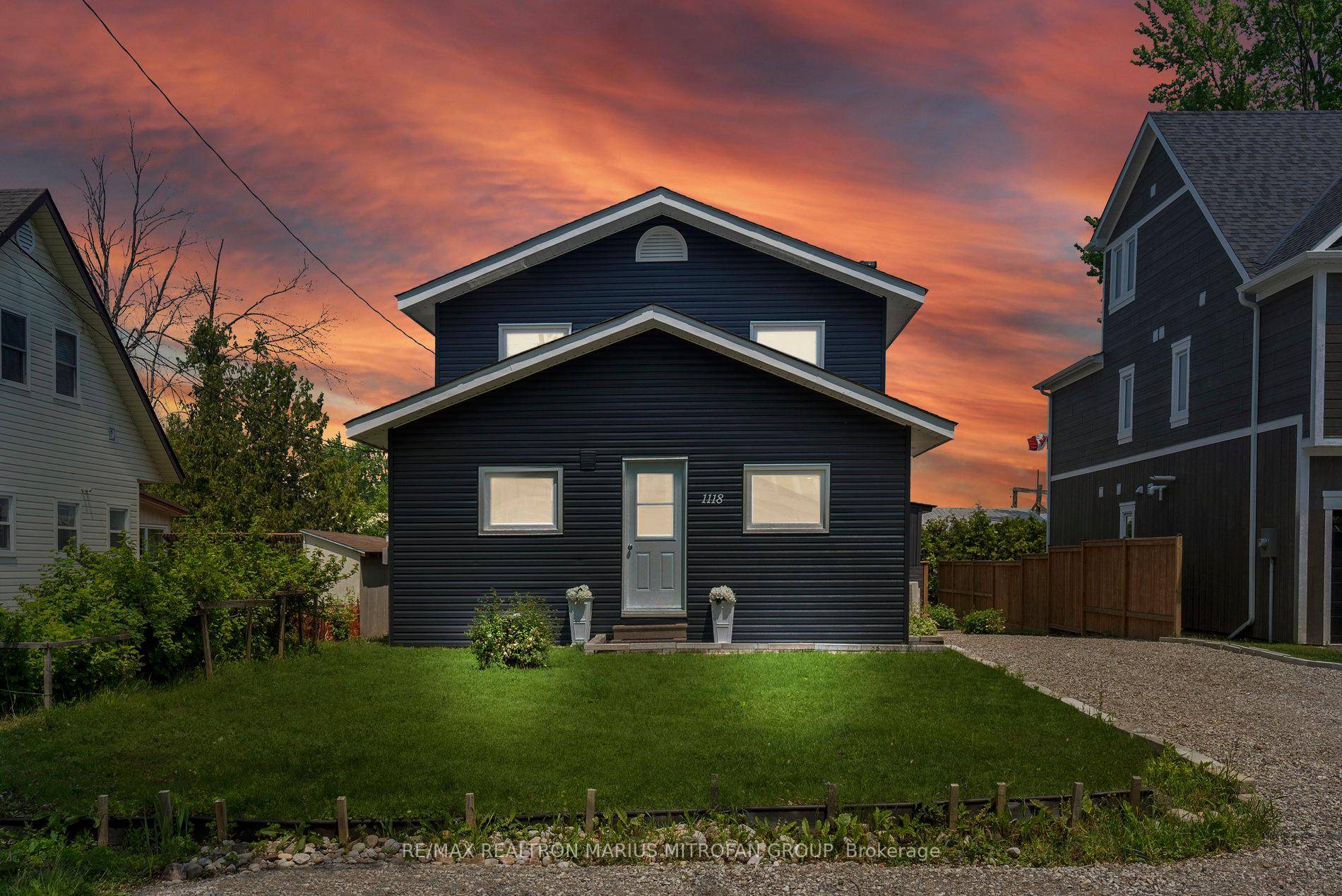 For Sale Renovated 4 Season Cottage Home with Private Boat Launch Access on Lake Simcoe.