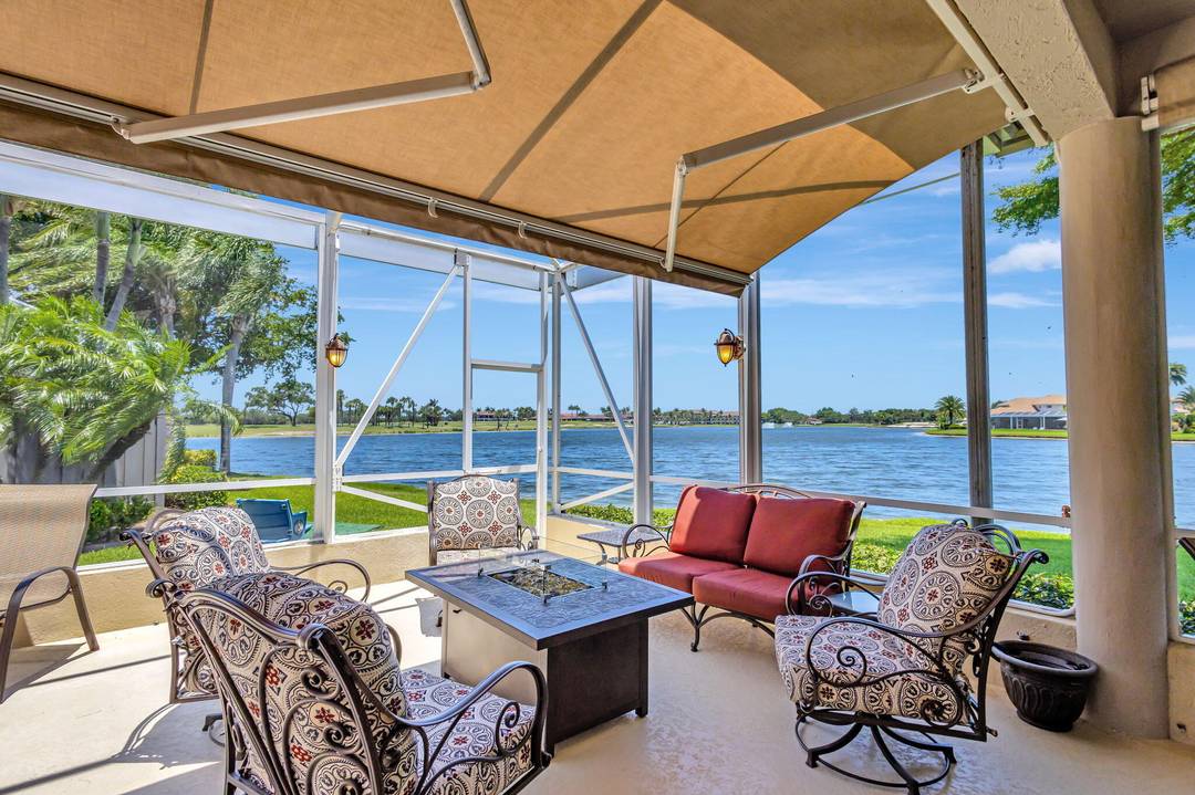 BEST VIEW IN PGA ! Welcome to this exceptional residence in the prestigious Augusta Pointe community of PGA National.