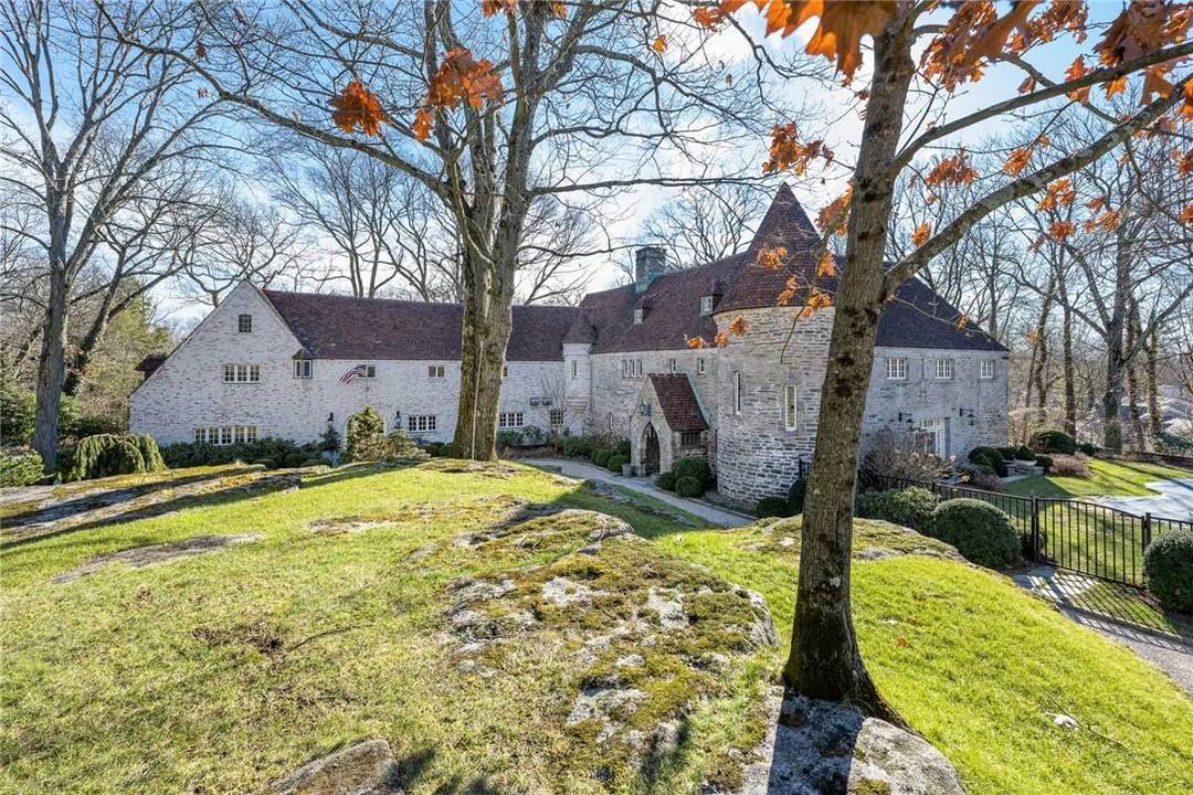 Magnificent French chateau built by famed architect Frank Forster is a timeless masterpiece set on a private 1.