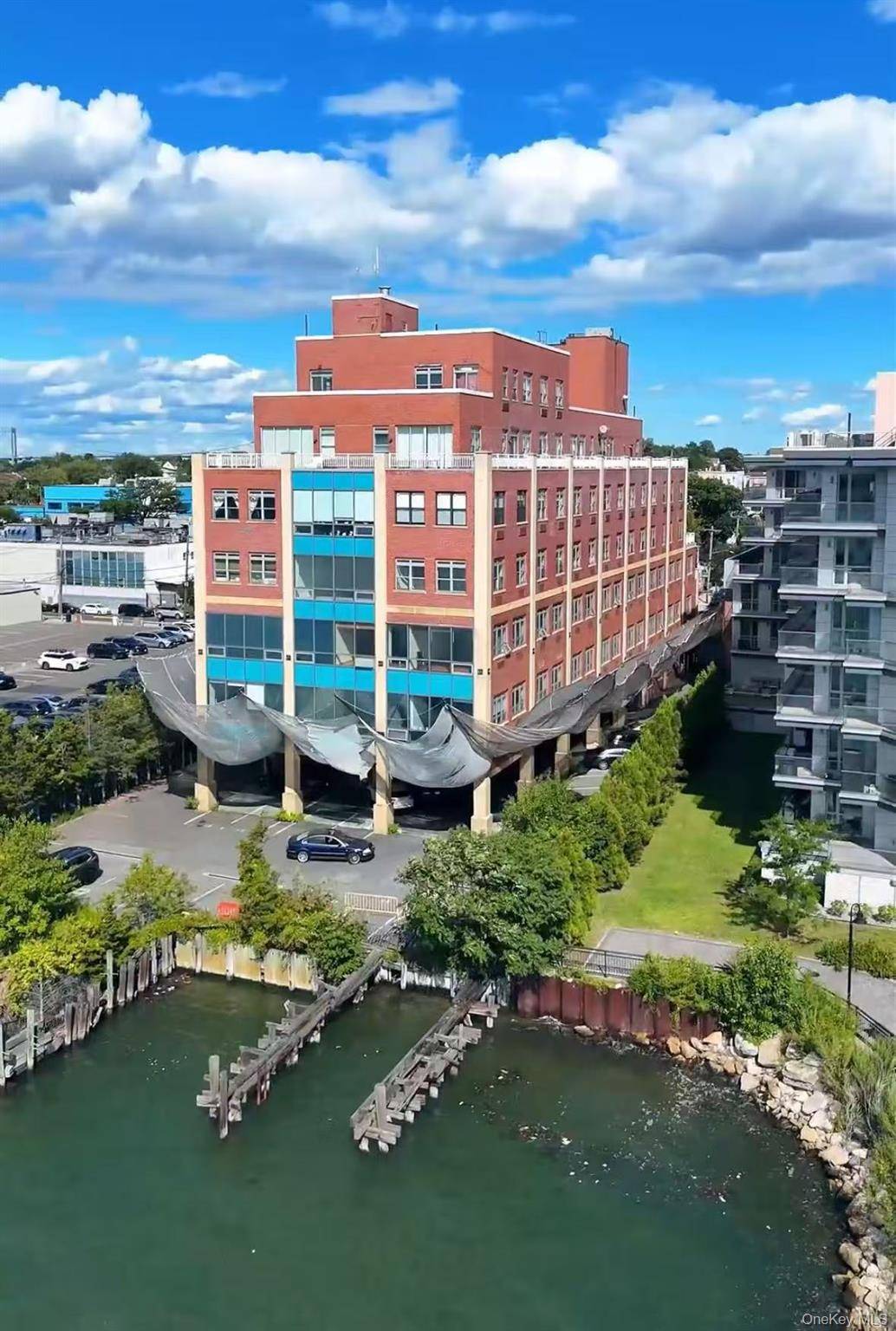 Experience Waterview Marina Condominium, a newly renovated waterfront residence at 14 34 110th Street, College Point, offering modern interiors, upgraded kitchens and baths, and a refreshed lobby with elevator access.