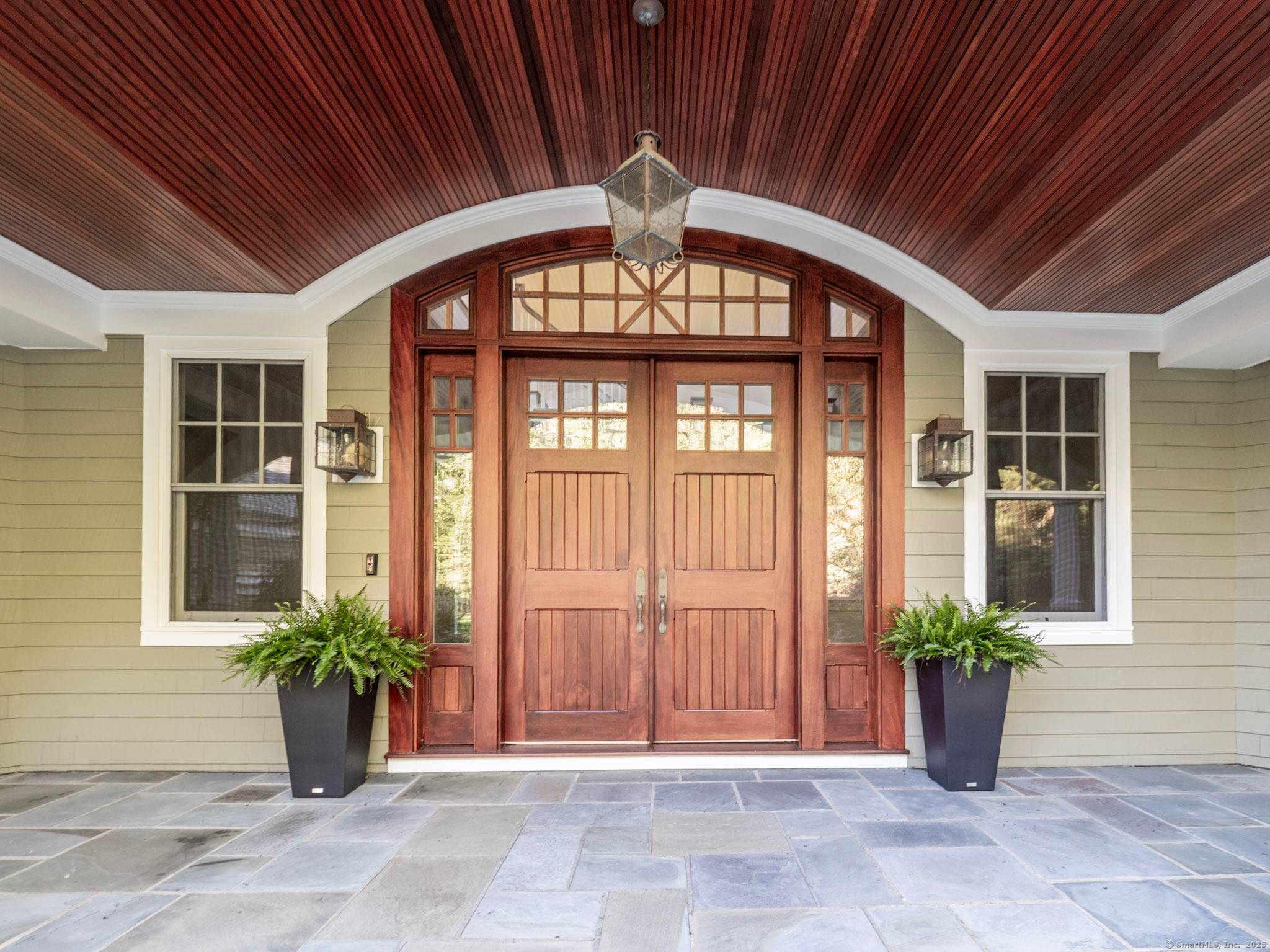 A rare opportunity to own a custom designed residence by renowned architect Peter Cadoux, nestled on a private cul de sac abutting Quarry Head Park Harrison Smith Preserve providing direct ...