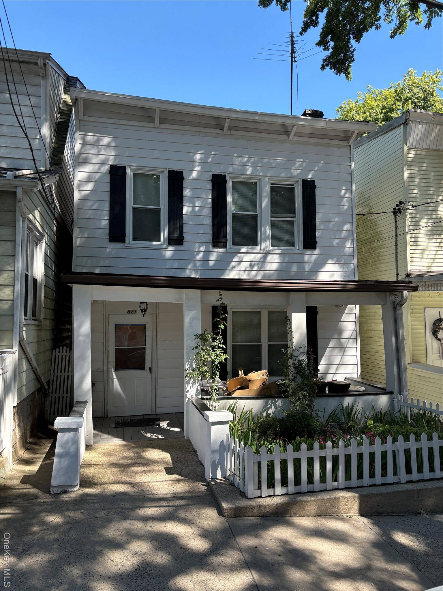 This beautiful Colonial 2 family home located on a quiet, residential block in Woodlawn.