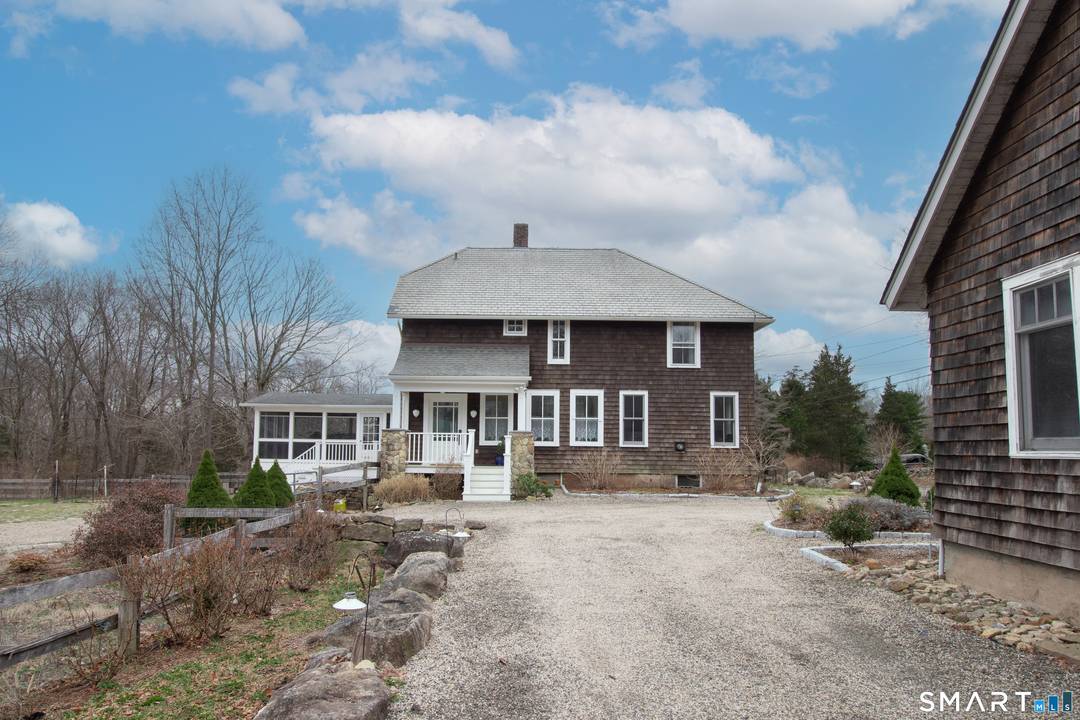 Nestled on a serene and expansive setting, 397 Moose Hill Road offers a unique combination of comfort, character, and privacy.