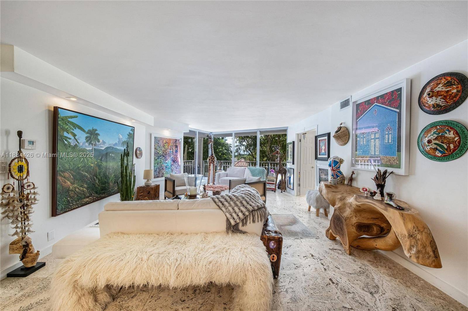 Beautiful 2BR 2BA retreat style residence on the 5th floor with serene garden and pond views.