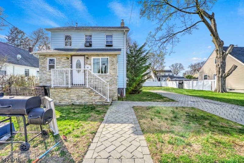 Welcome home to this charming Teaneck colonial !