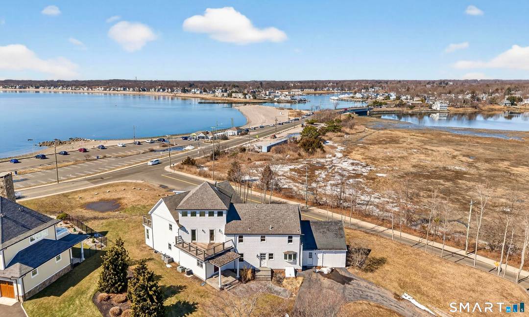 Perched high atop a scenic bluff, this extraordinary coastal retreat offers some of the most breathtaking water views in all of Milford, with sweeping, nearly 360 degree vistas of Long ...