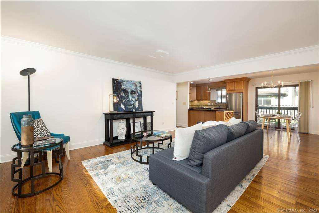 Experience modern comfort and style in this spacious ranch style condo, perfectly situated in a sought after gated community in mid city Stamford.