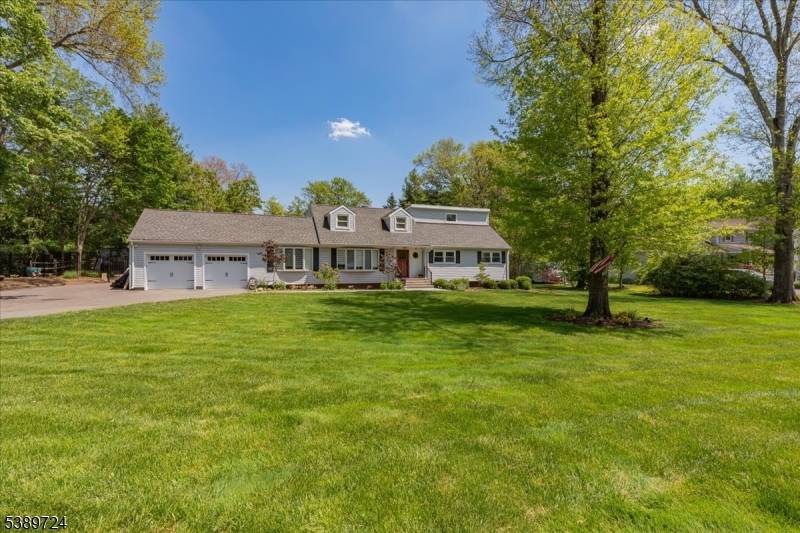 This one of a kind home showcases an expanded 1st floor primary suite with a renovated spa like bath, oversized walk in closet, 3 extra closets, sliding doors directly to ...