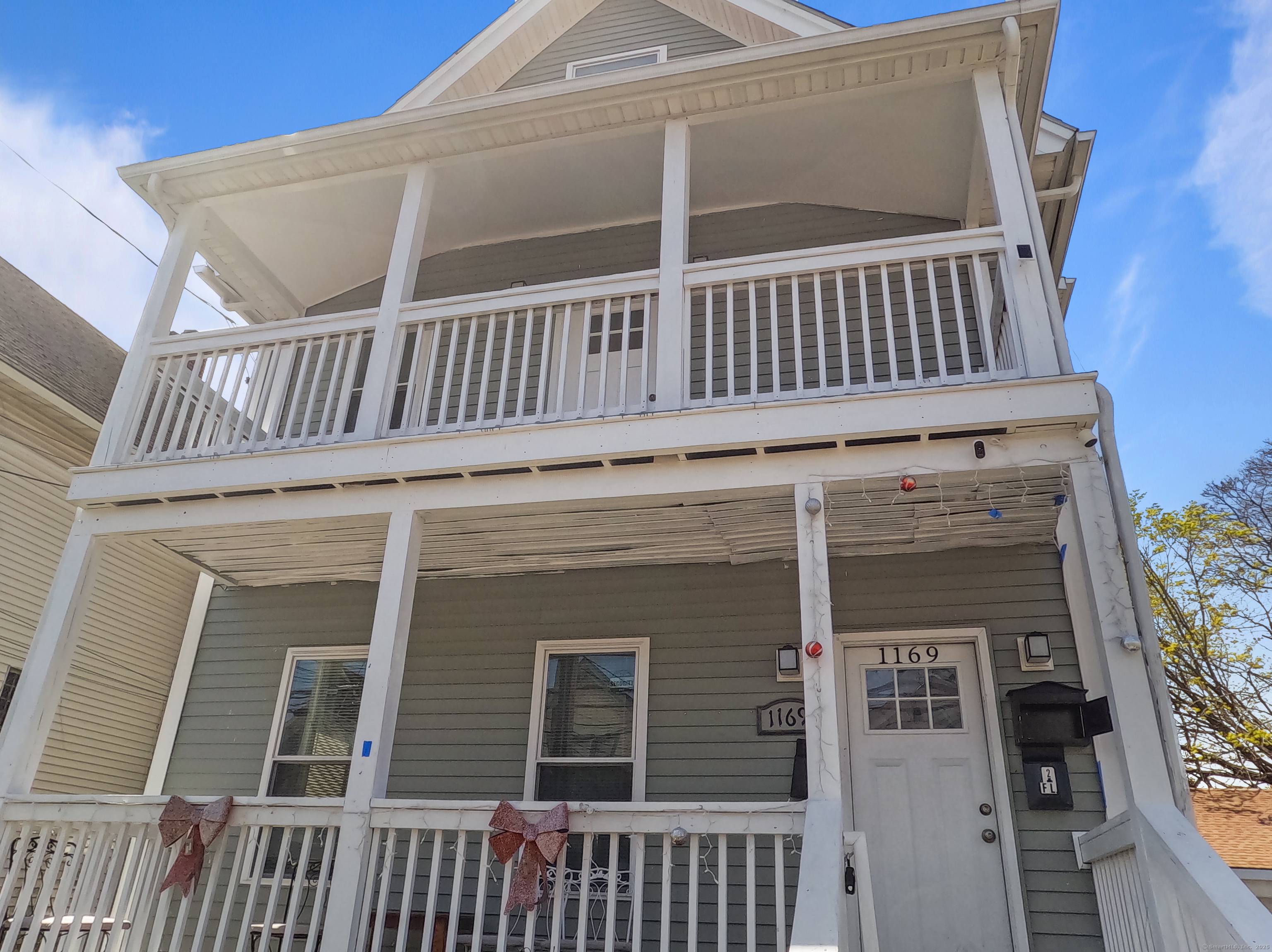 STEP INTO THIS SPACIOUS AND WELL CARED FOR 2 FAMILY HOME, PERFECT FOR BOTH SAVVY INVESTORS AND HOMEOWNERS SEEKING FLEXIBILITY !