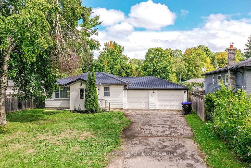 Fully renovated turn key Bungalow situated on a large mature 60ft by 202ft fully fenced lot !
