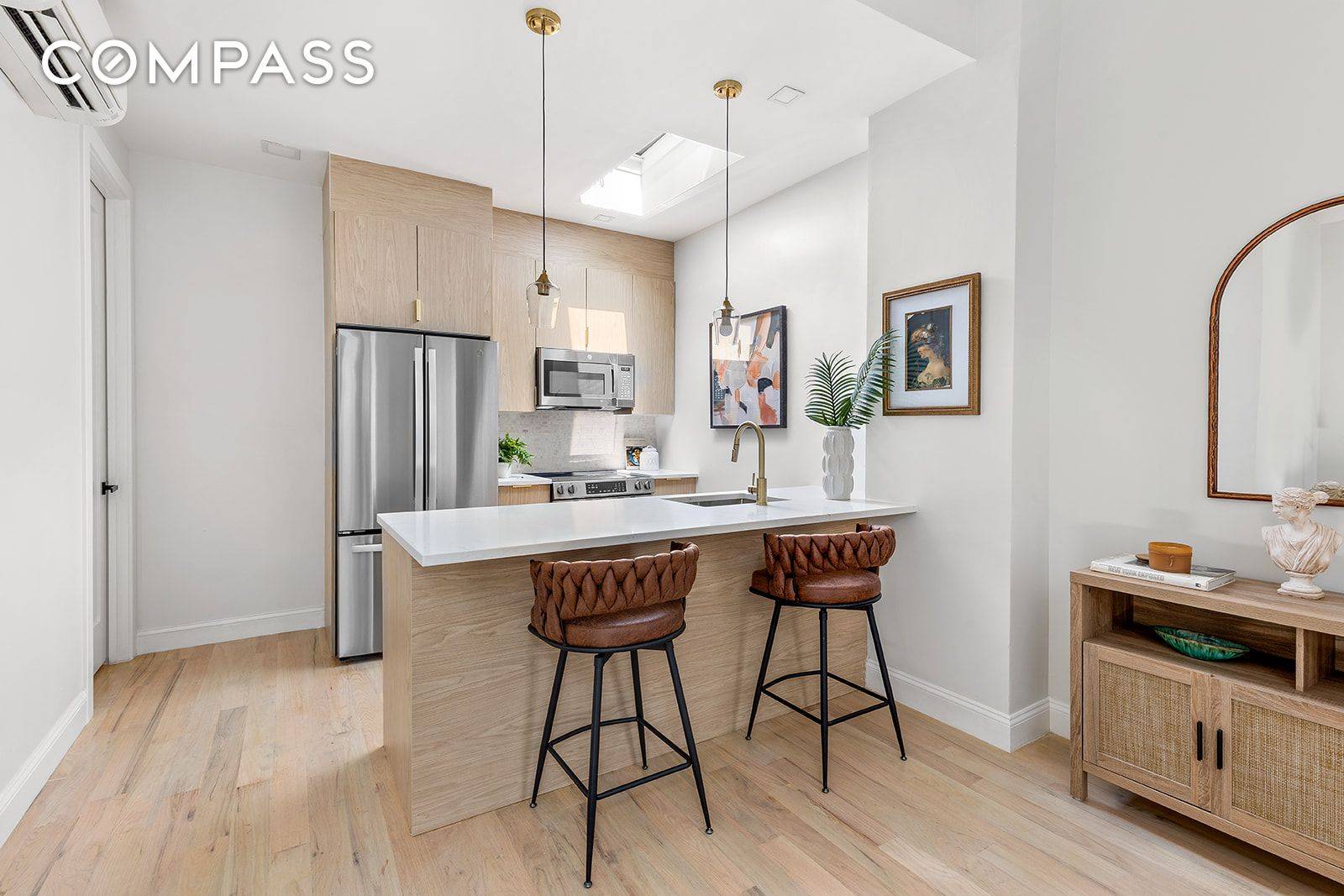 285 Cooper Street is a newly renovated two family brick townhouse with a bold black fac ade, offering 5 bedrooms and 5 full bathrooms across three levels in the heart ...