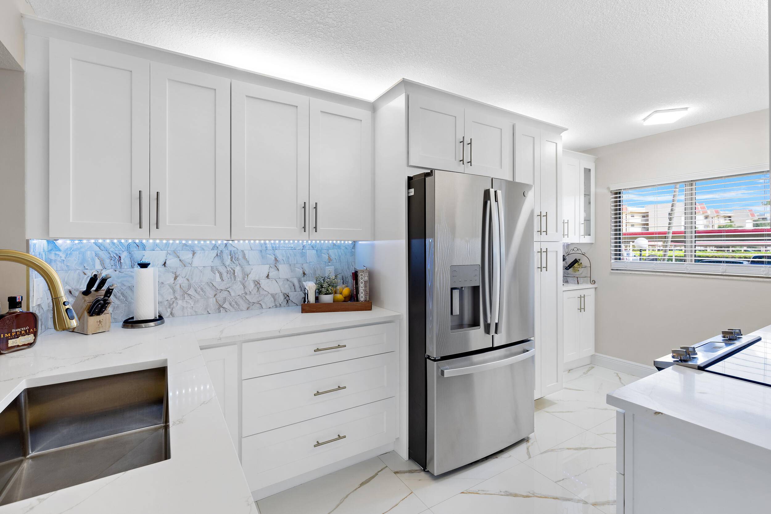 Welcome to this STUNNING, FIRST FLOOR, 2 bedroom, 2 bathroom condo.