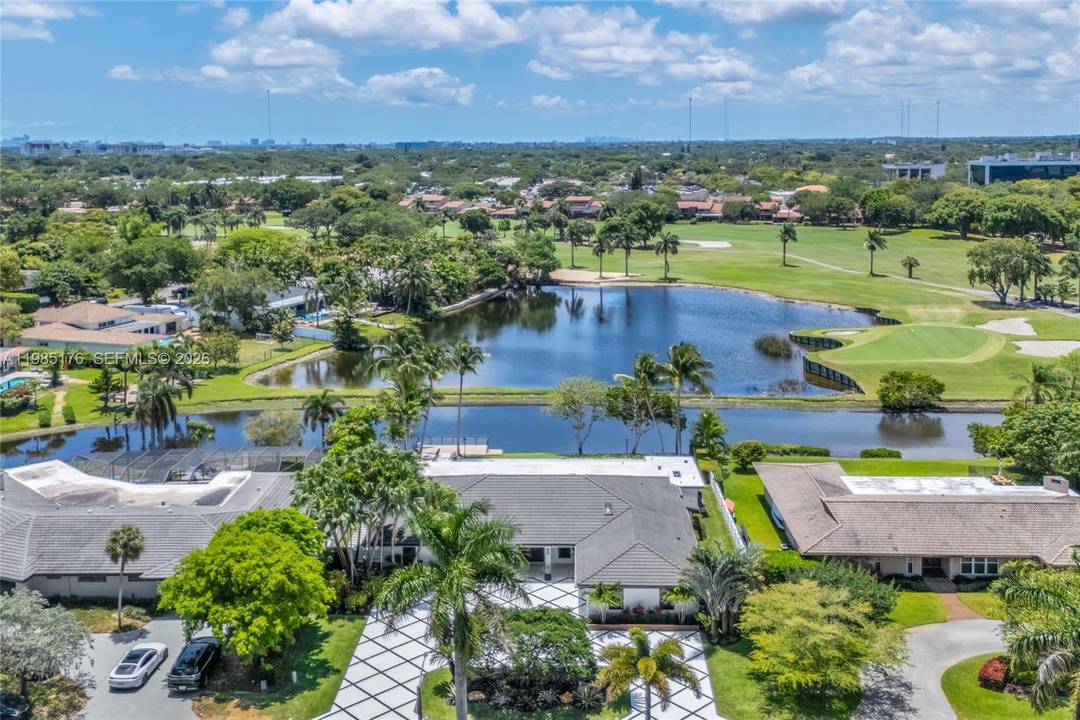 One of the most unique homes in Emerald Hills, offering the rare combination of ocean access, panoramic lake, canal, and golf course views, and a level of finish seldom seen ...