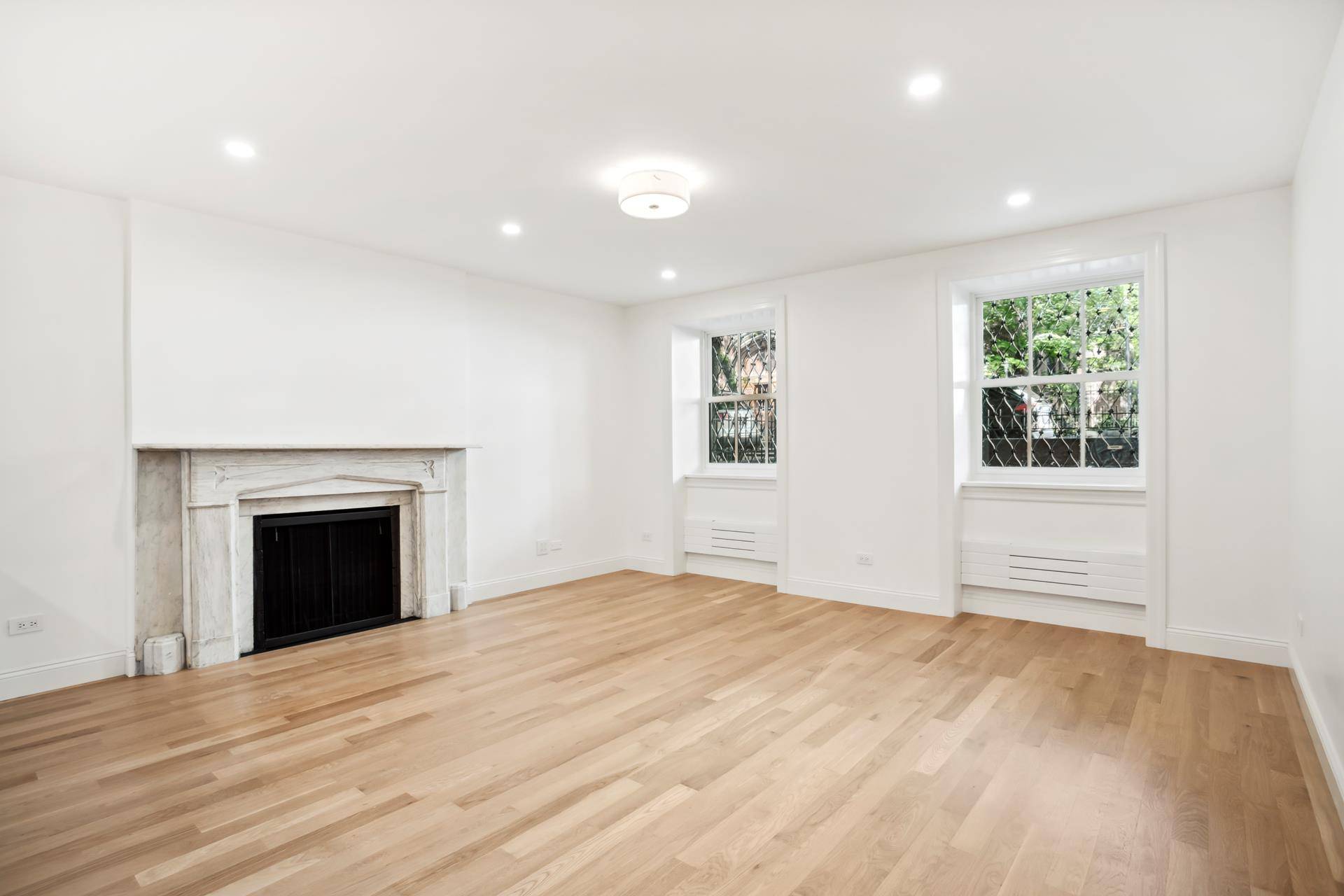 119 Henry Street Apt 1 A Brooklyn Heights Garden Home Redeveloped with Style and Space.