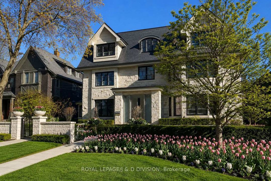 A landmark Lytton Park estate set on a rare 67 x 244 ft ravine lot backing onto Chatsworth Ravine.