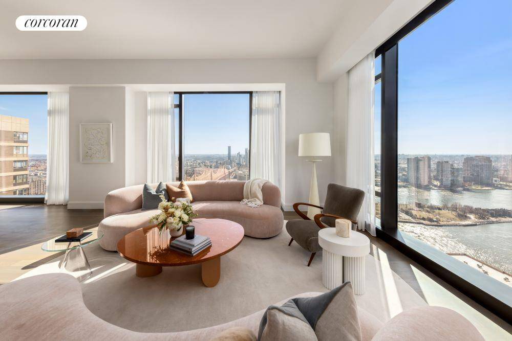 YOUR CORNER OF THE SKY ! Live where Billionaires' Row meets the water's edge with unrivaled views spanning from the East River to the Atlantic Ocean, the Midtown Skyline and ...
