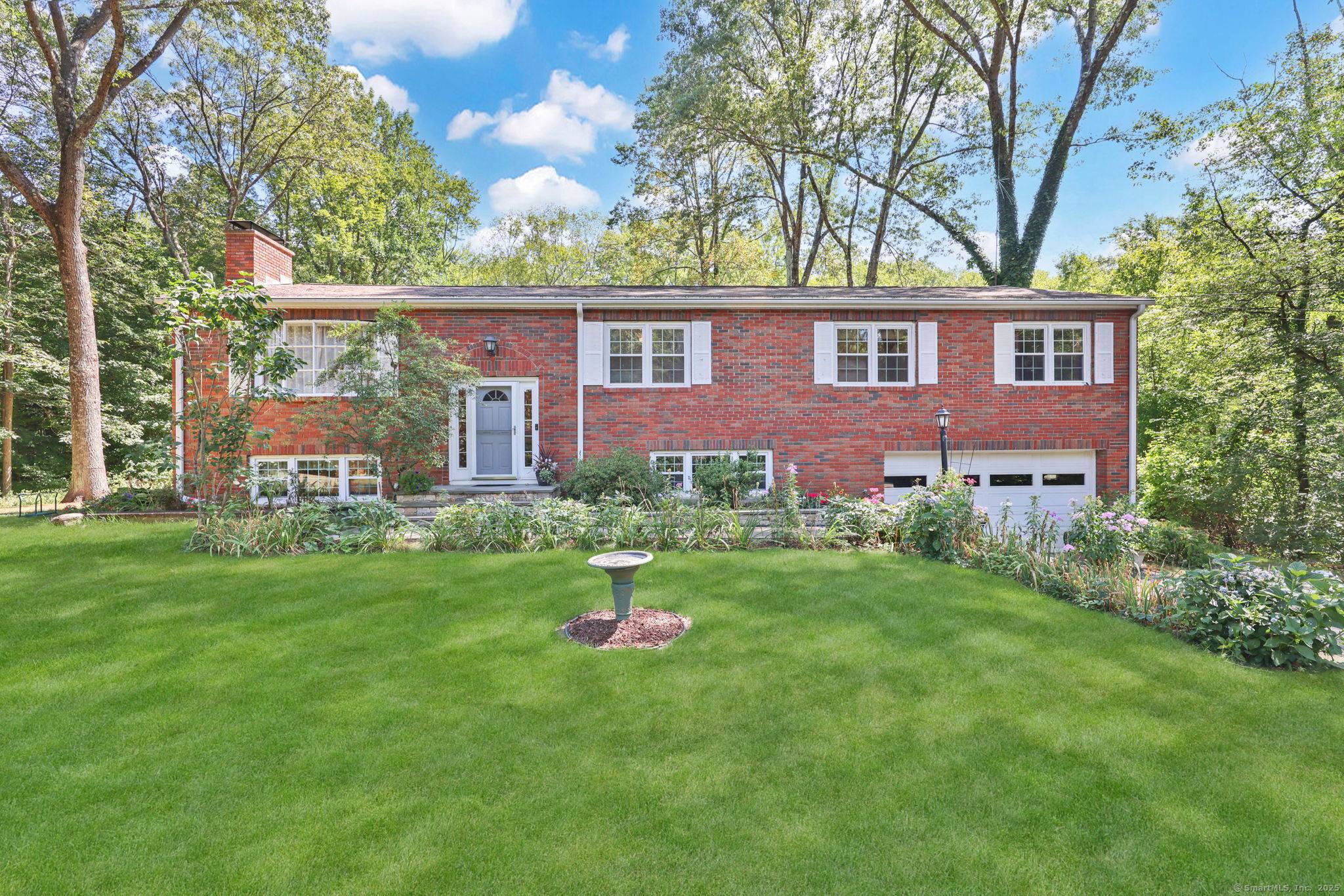 Nestled in the desirable Whitney Farms community, this 4 bedroom, 3 full bath raised ranch blends modern updates with inviting warmth.