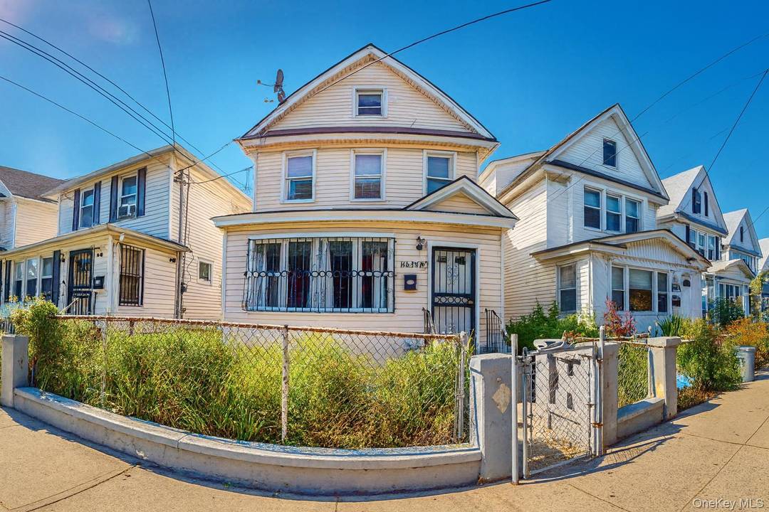 Welcome to this versatile legal two family home in the heart of Jamaica, Queens !