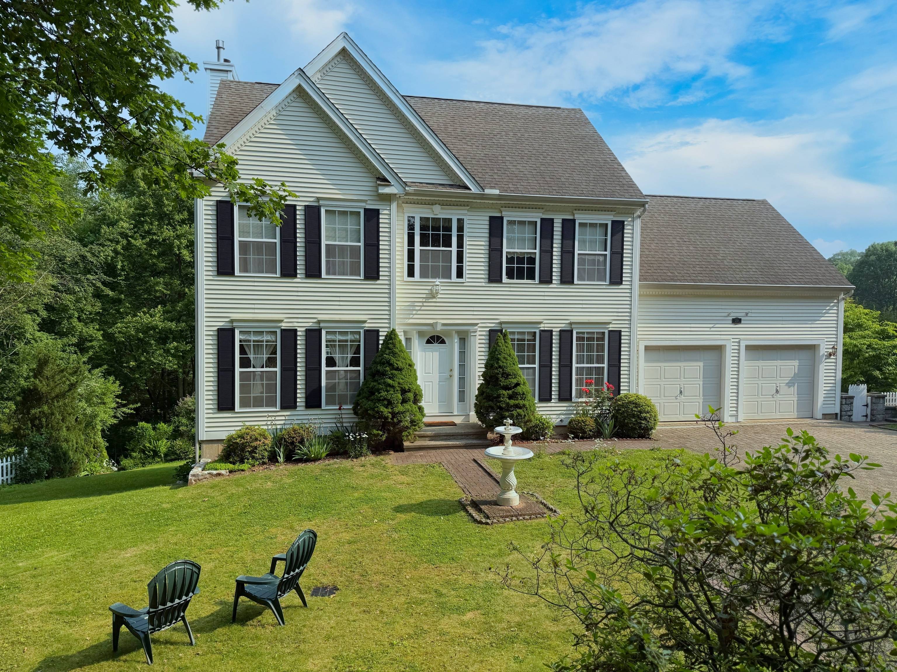 Discover the perfect blend of tranquility and convenience in this beautifully crafted Colonial residence.
