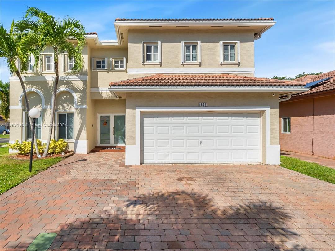 This beautiful two story corner lot home combines style and functionality.