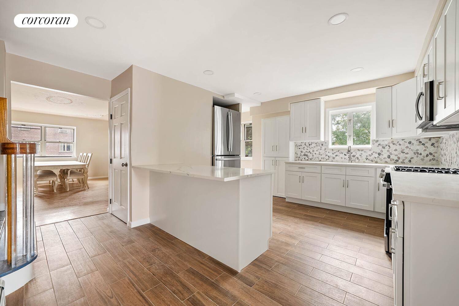 Prime Canarsie corner two family brick home with garage one block away from Canarsie Park !