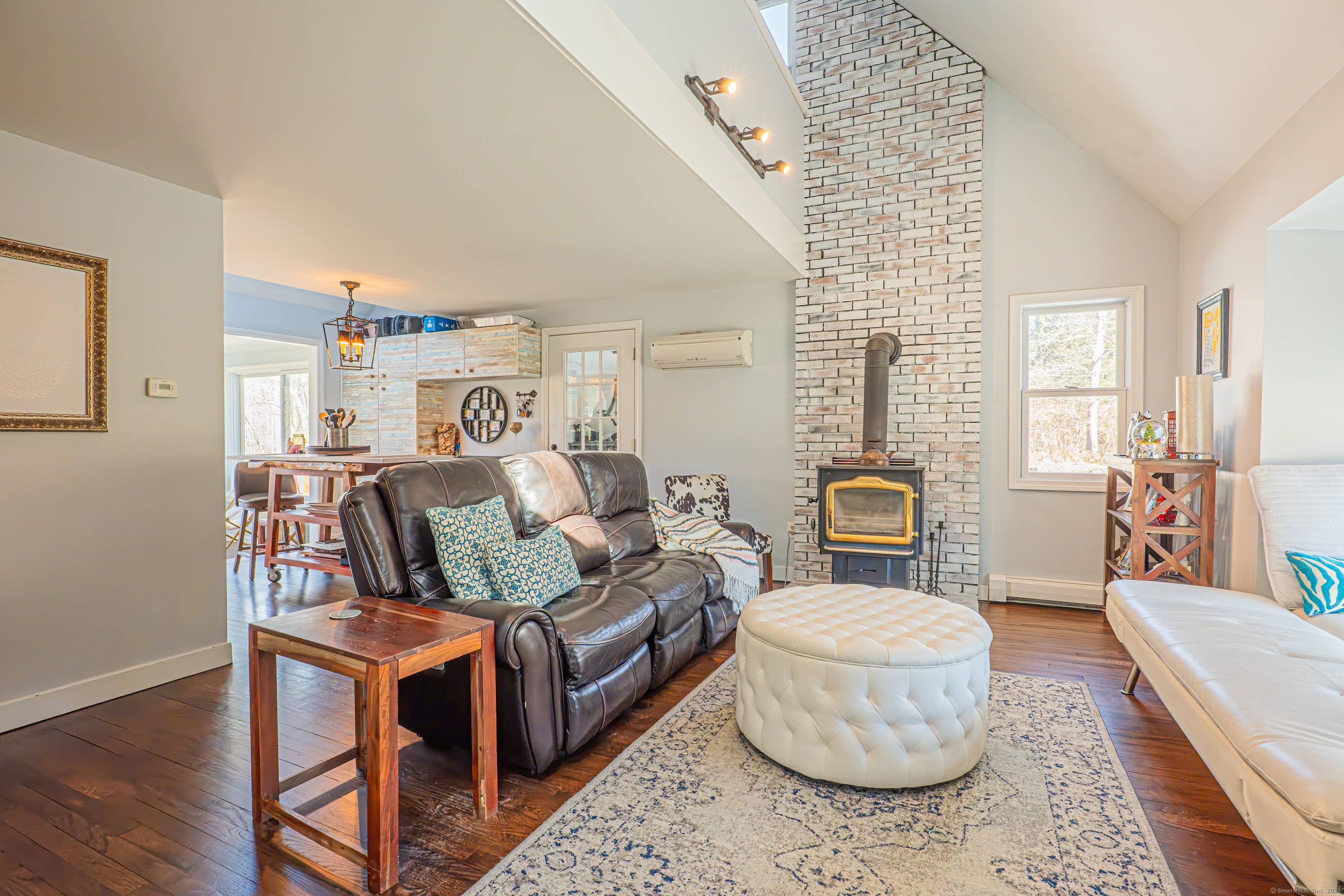 Nestled in a serene and private neighborhood, this beautiful contemporary Cape style home offers the perfect balance of peaceful living and convenience.